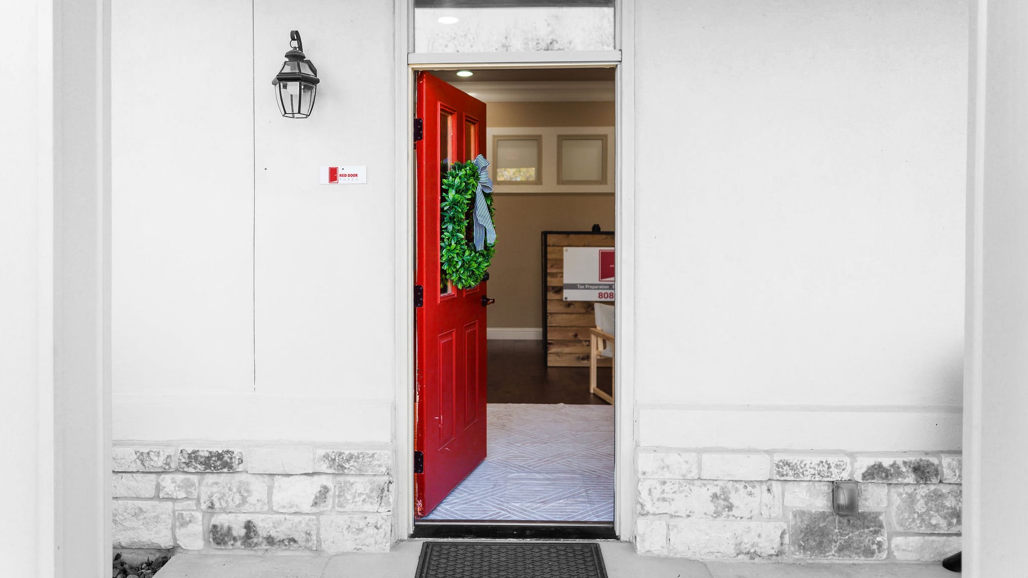 The red front door of the Red Door Taxes office